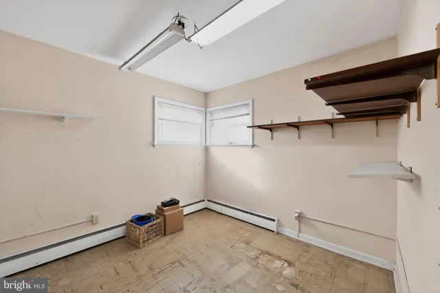 a view of a room with racks on the wall