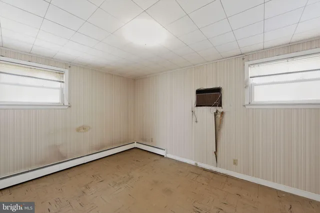 an empty room with windows