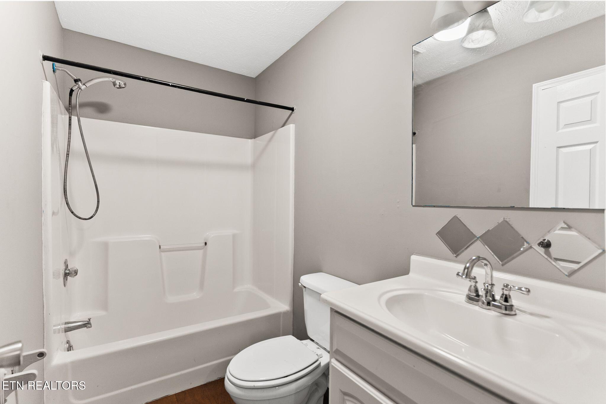 168 Church Road La Follette, TN 37766 - Photo 22 of 54 Guest Bathroom - Main Level