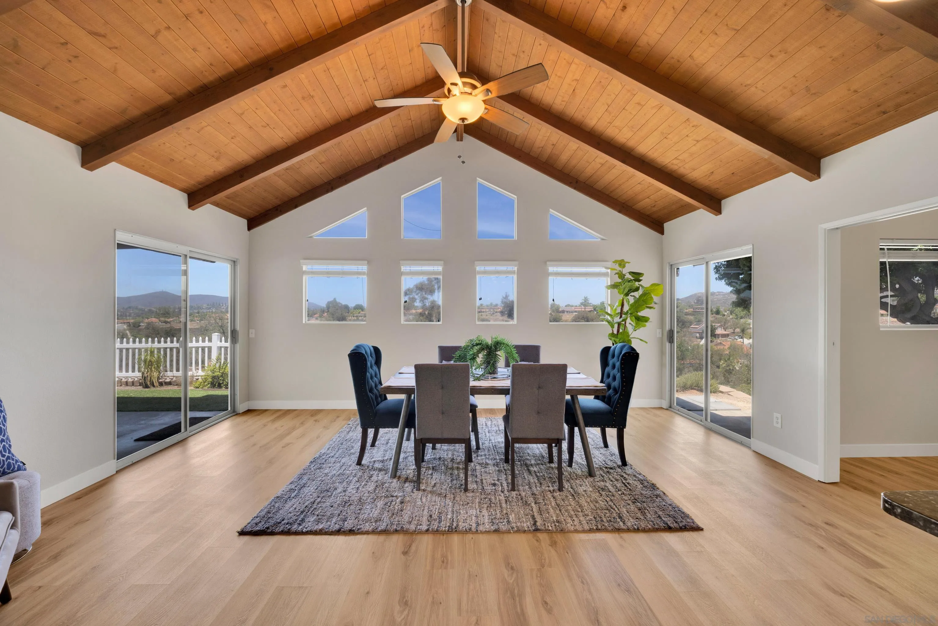 13710 Ahwahnee Way Poway, CA 92064 - Photo 14 of 43 a view of a dining room with furniture window and wooden floor