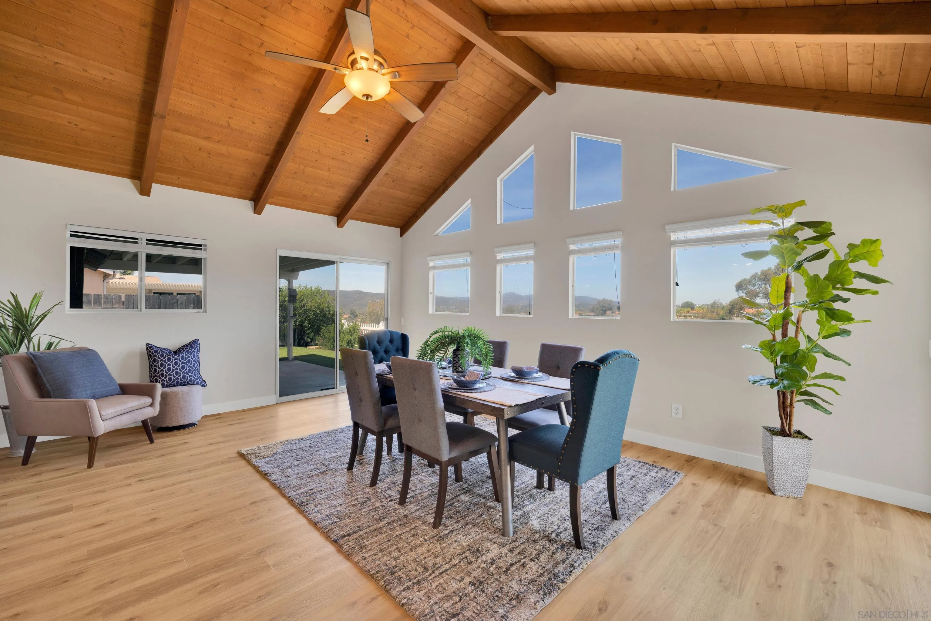 13710 Ahwahnee Way Poway, CA 92064 - Photo 15 of 43 a view of a dining room with furniture window and wooden floor