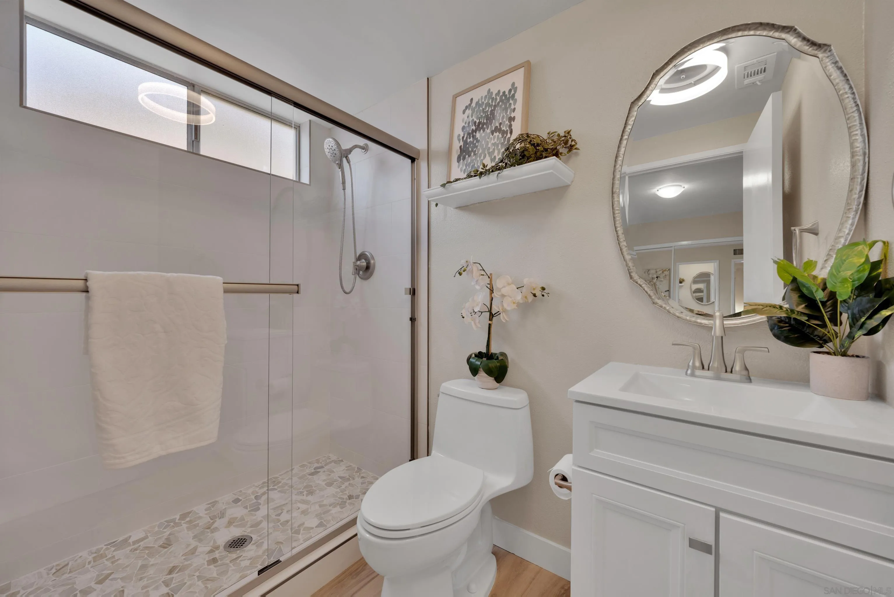 13710 Ahwahnee Way Poway, CA 92064 - Photo 19 of 43 a bathroom with a sink toilet and shower