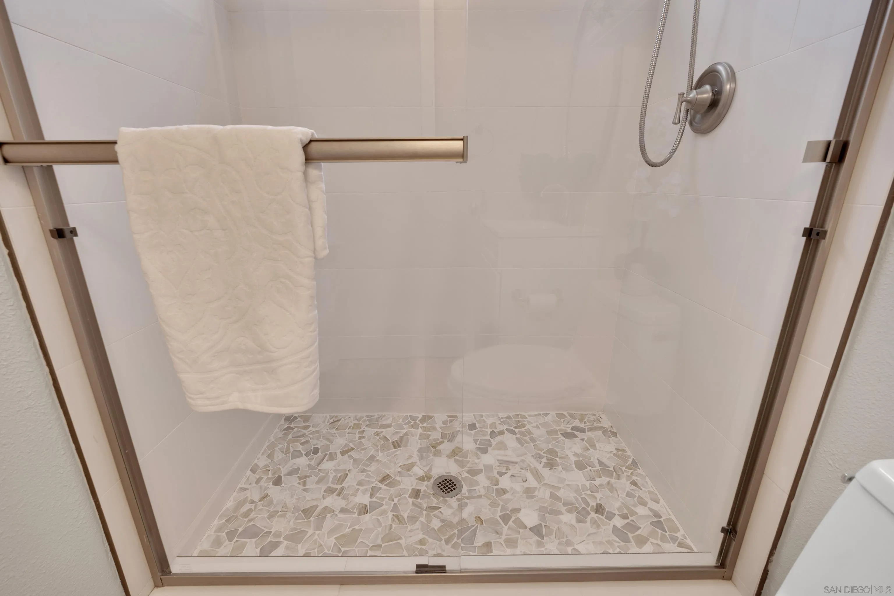 13710 Ahwahnee Way Poway, CA 92064 - Photo 20 of 43 a bathroom with a shower