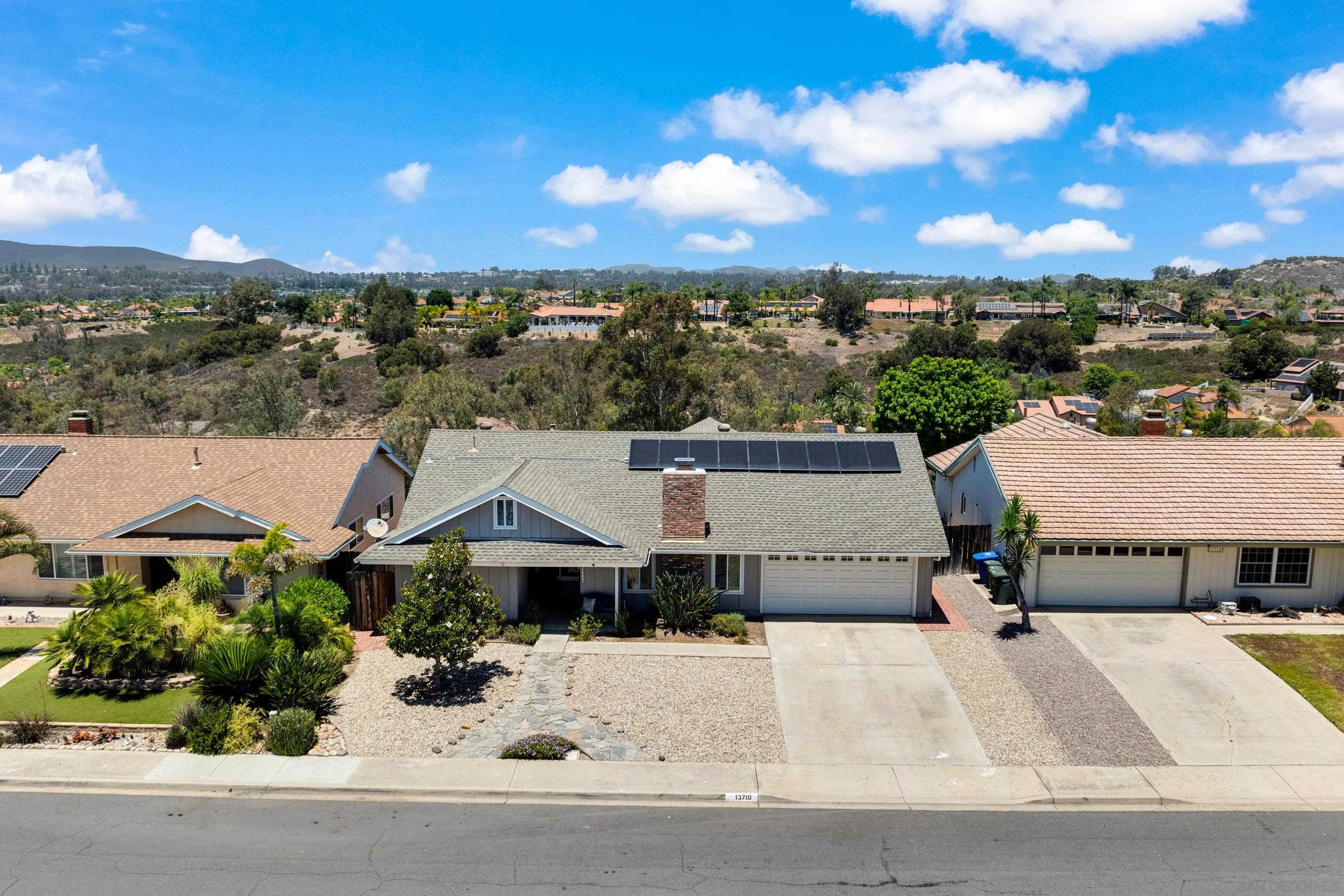 13710 Ahwahnee Way Poway, CA 92064 - Photo 2 of 43 an aerial view of a house with a yard