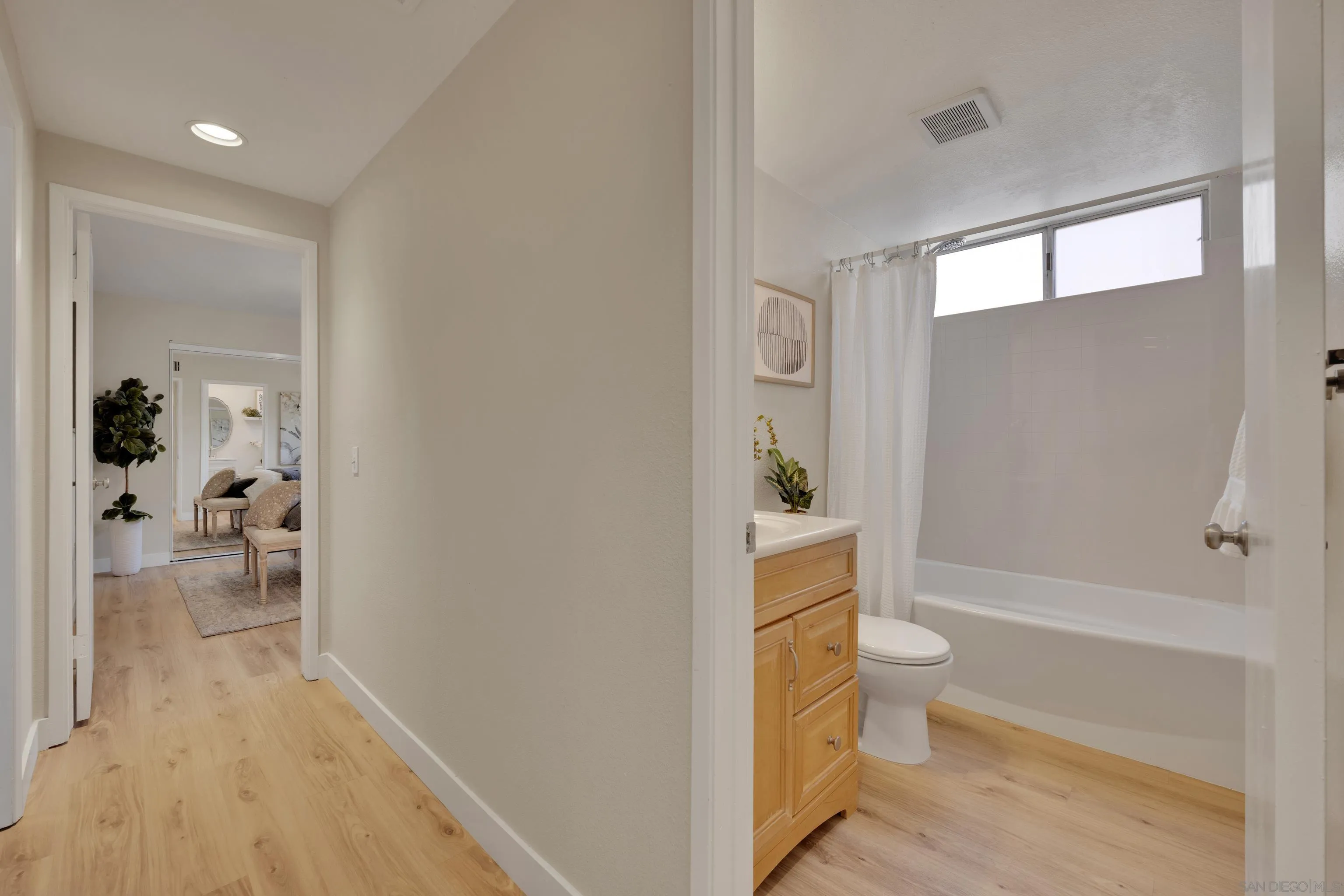 13710 Ahwahnee Way Poway, CA 92064 - Photo 21 of 43 a bathroom with a sink a toilet and shower