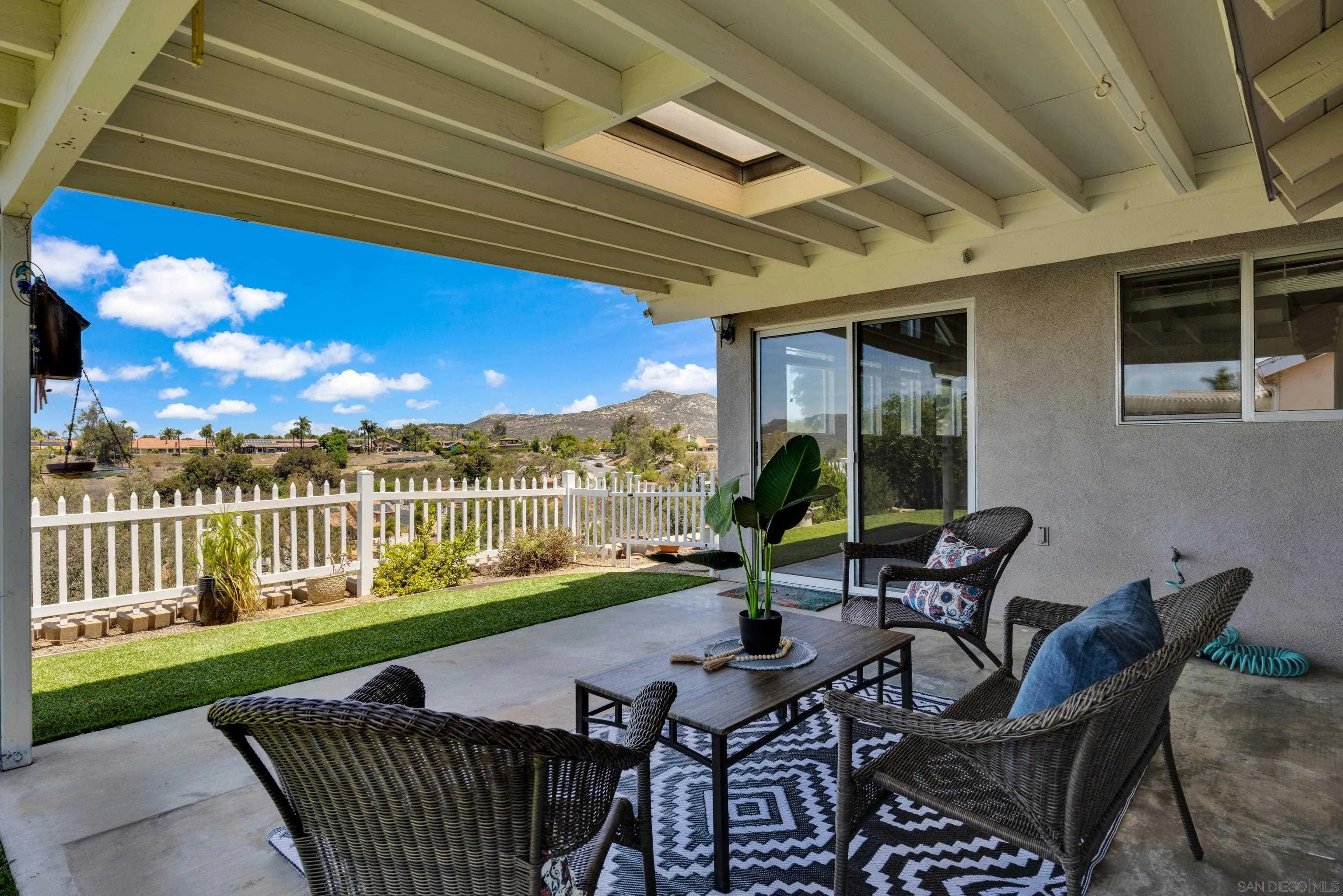 13710 Ahwahnee Way Poway, CA 92064 - Photo 31 of 43 a view of a chair and tables in the patio