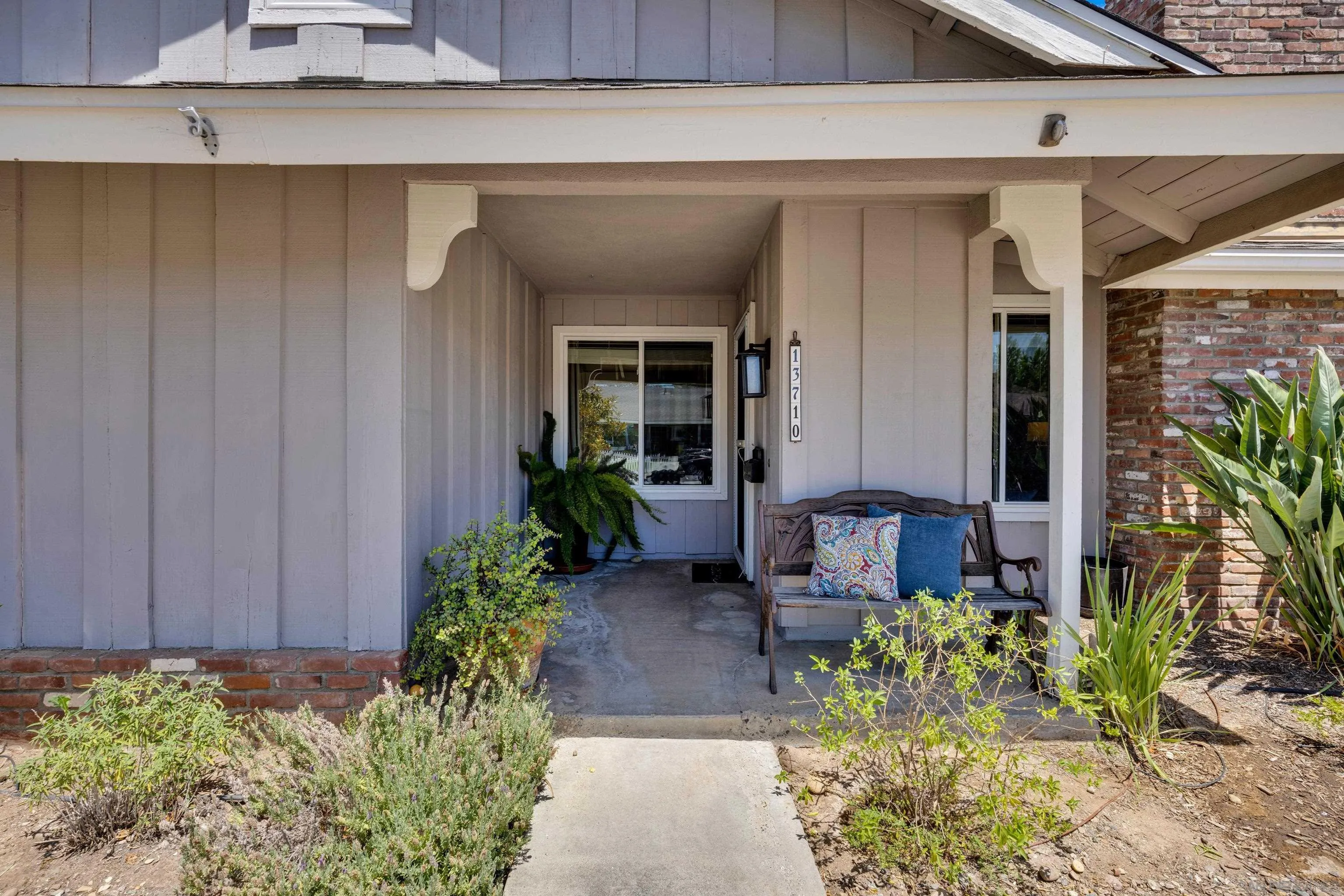 13710 Ahwahnee Way Poway, CA 92064 - Photo 4 of 43 a front view of a house