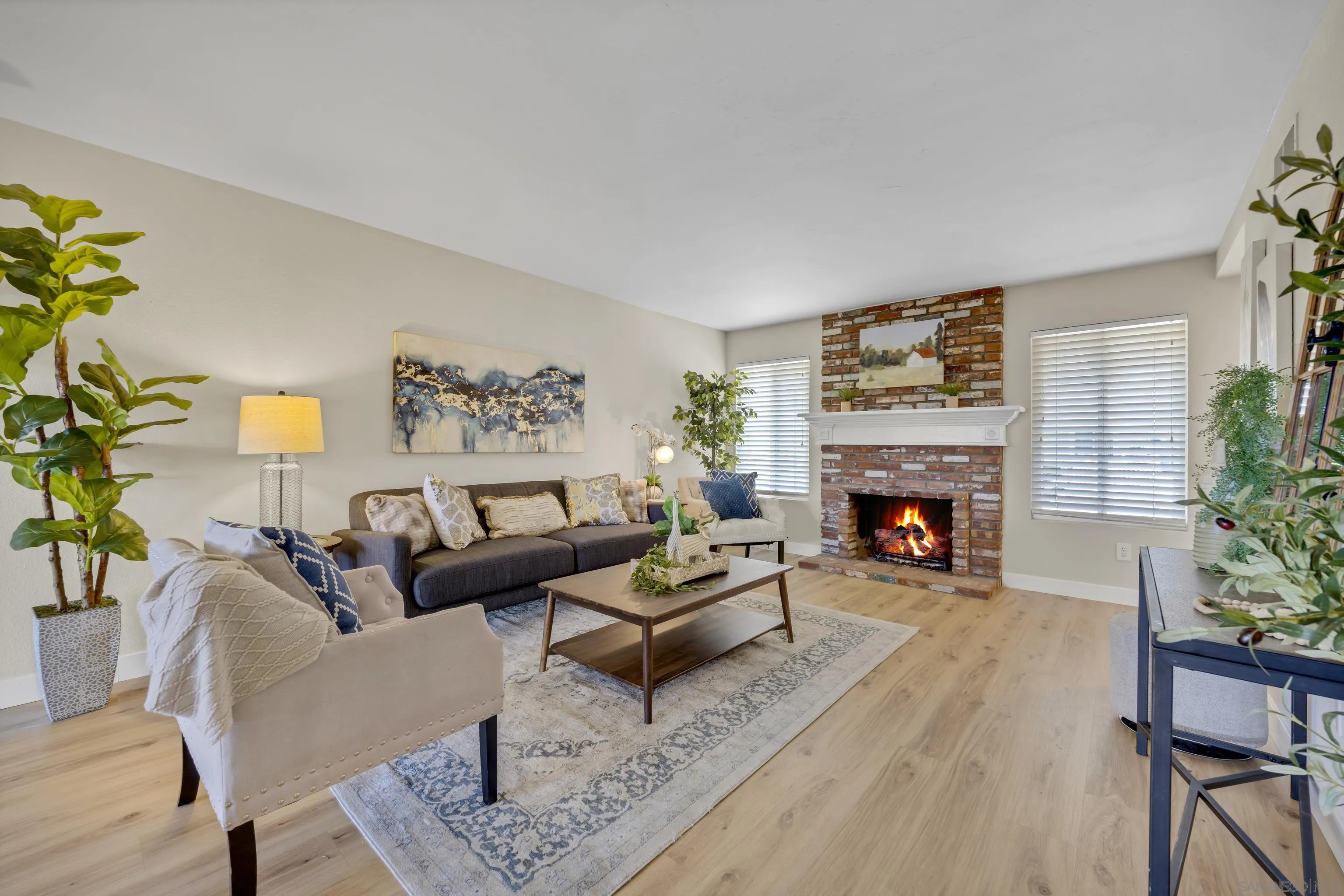 13710 Ahwahnee Way Poway, CA 92064 - Photo 6 of 43 a living room with furniture and a fireplace