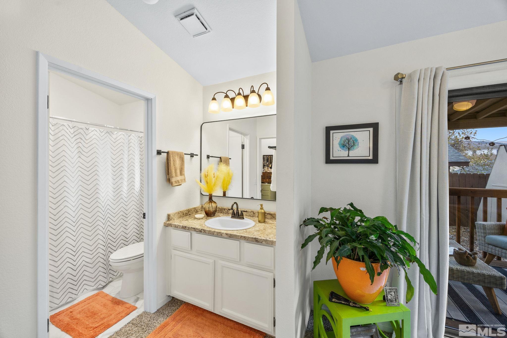 115 Stonecrest Drive Verdi, NV 89439 - Photo 19 of 28 a white room with a sink and a mirror