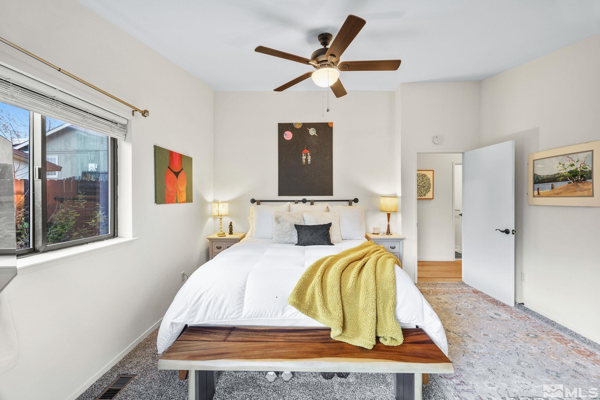 115 Stonecrest Drive Verdi, NV 89439 - Photo 20 of 28 a living room with a bed furniture and a window