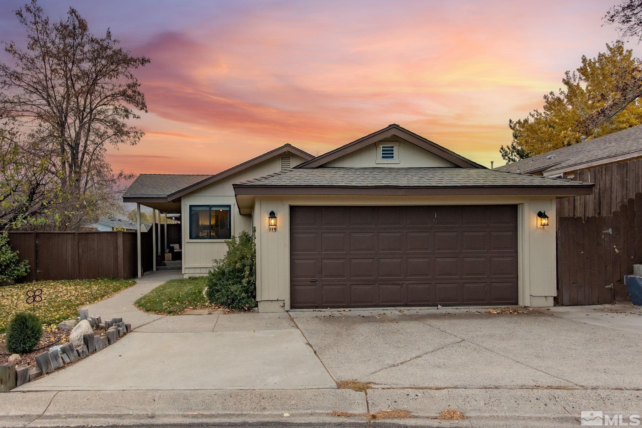 115 Stonecrest Drive Verdi, NV 89439 - Photo 2 of 28 a front view of a house with a garage
