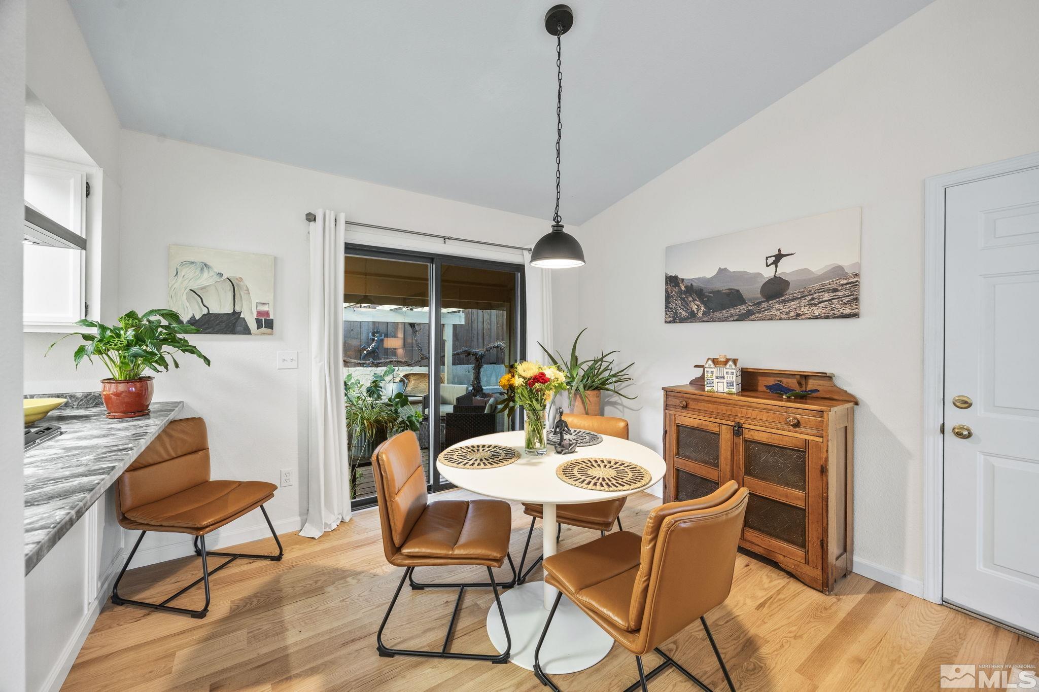115 Stonecrest Drive Verdi, NV 89439 - Photo 6 of 28 a view of a dining room with furniture window and wooden floor