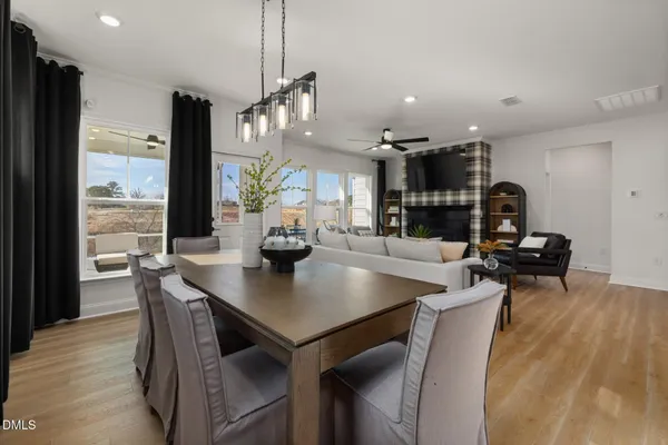a kitchen with stainless steel appliances granite countertop a refrigerator and cabinets