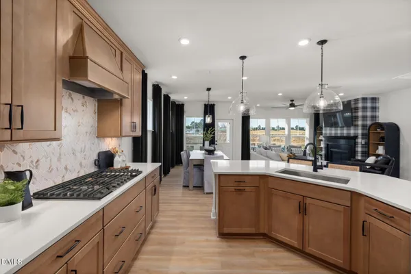 a large kitchen with stainless steel appliances