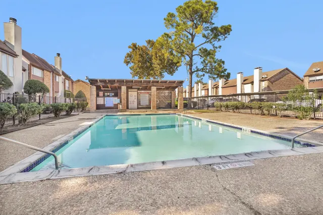 a view of a house with a swimming pool