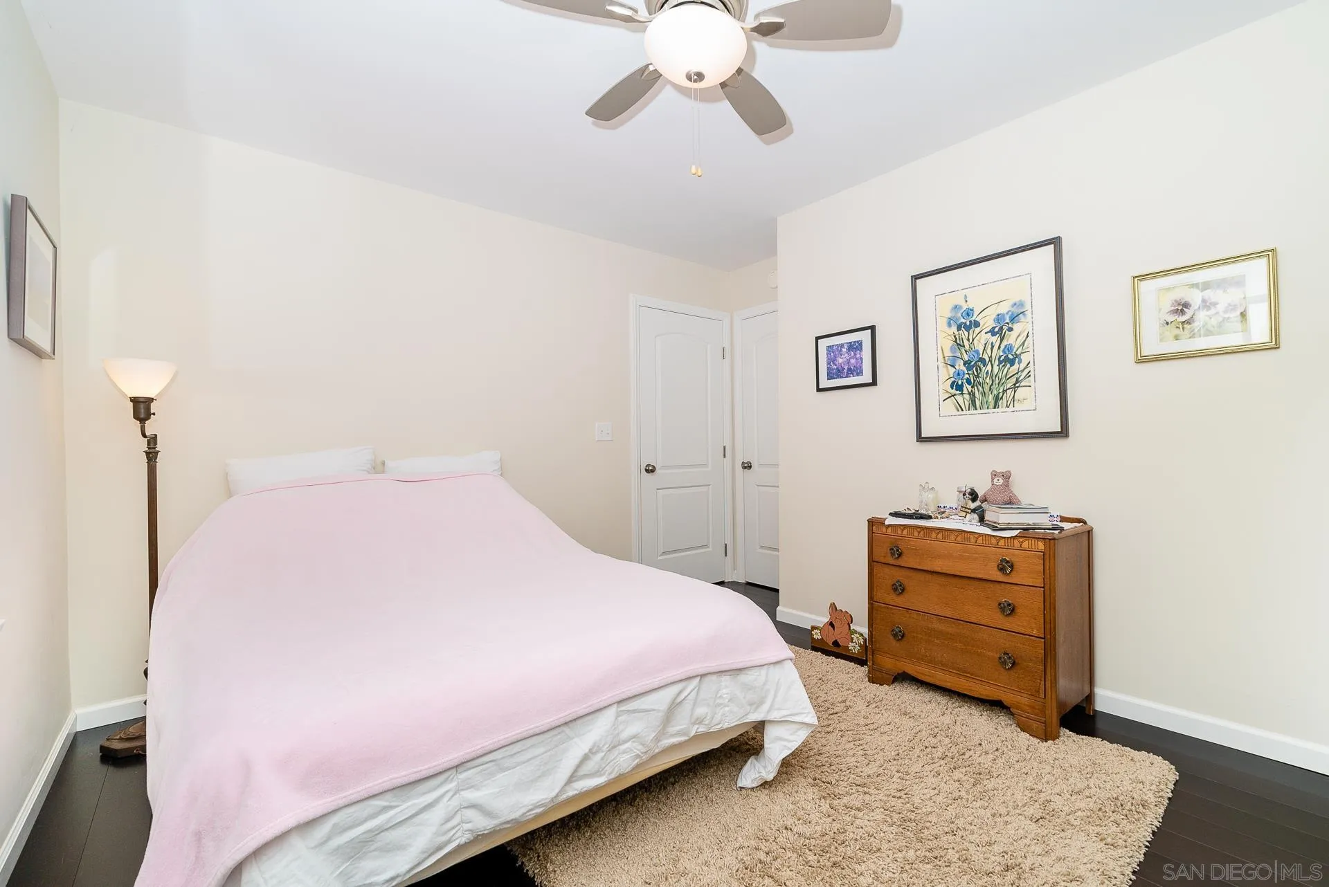 329 Greenview Lane Fallbrook, CA 92028 - Photo 23 of 53 a bedroom with a bed and a chandelier
