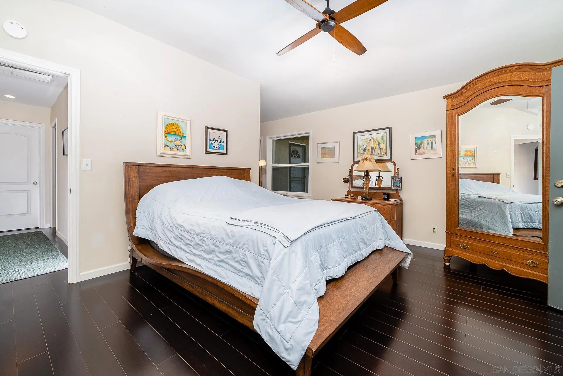 329 Greenview Lane Fallbrook, CA 92028 - Photo 28 of 53 a bedroom with a bed and wooden floor