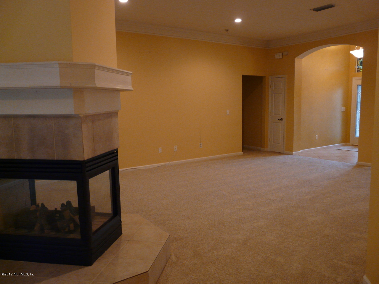 8050 Timbermill Road Jacksonville, FL 32256 - Photo 11 of 18 Three-sided fireplace