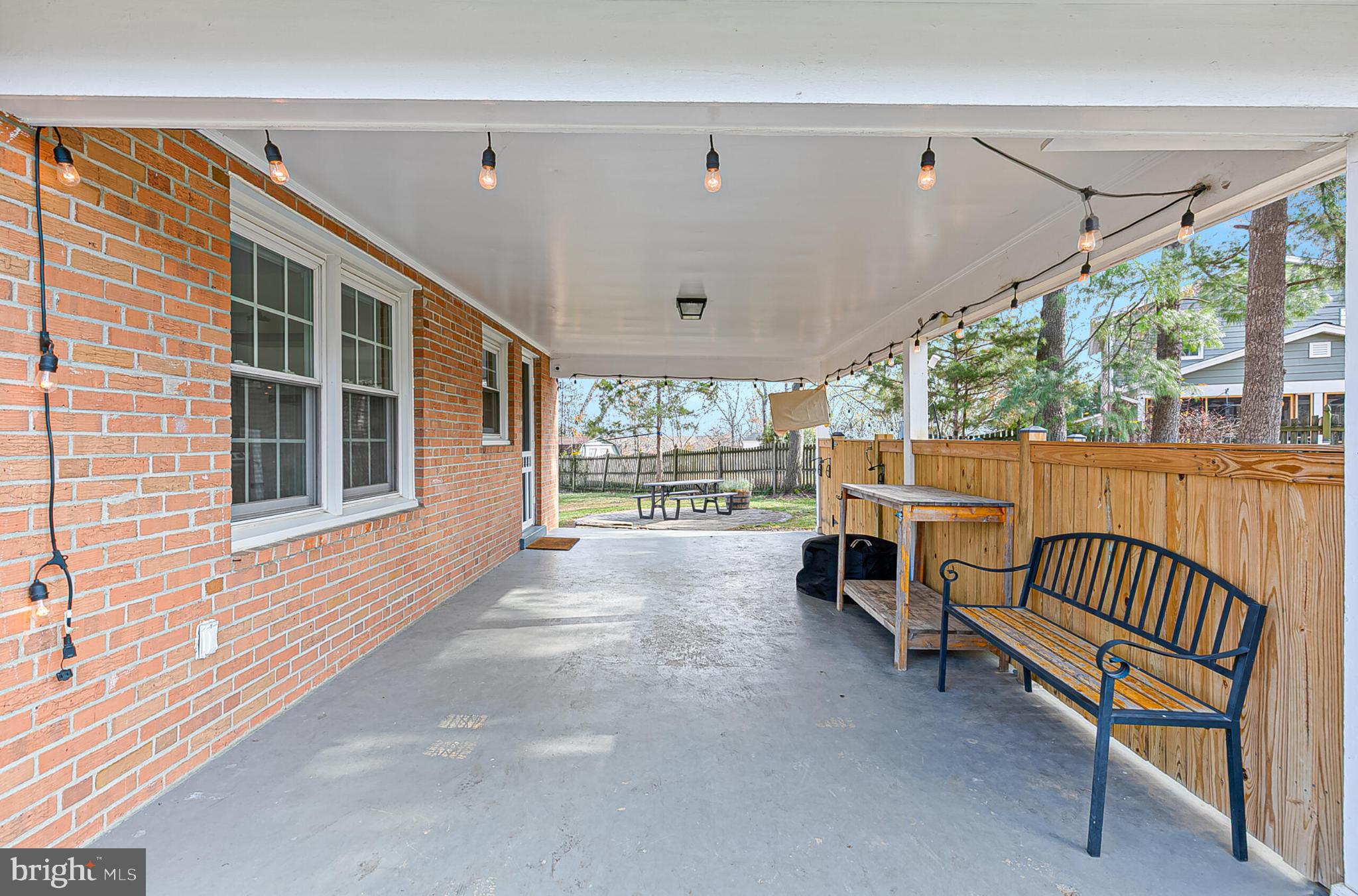 3419 Ramsgate Terrace Alexandria, VA 22309 - Photo 36 of 36 Charming covered patio with warm lighting.