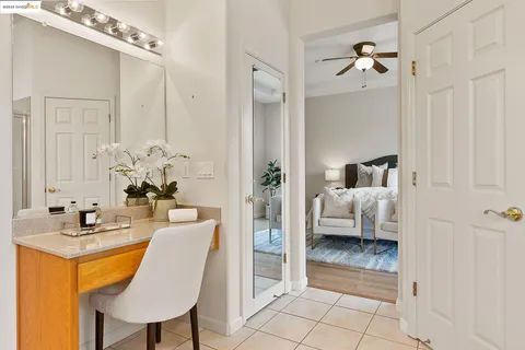 a bath tub sitting in a bathroom next to a window