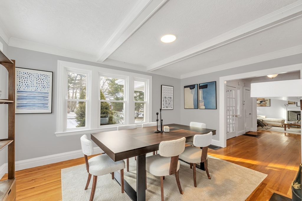 231 Lagrange Street Boston, MA 02132 - Photo 15 of 42 a view of a dining room with furniture and wooden floor