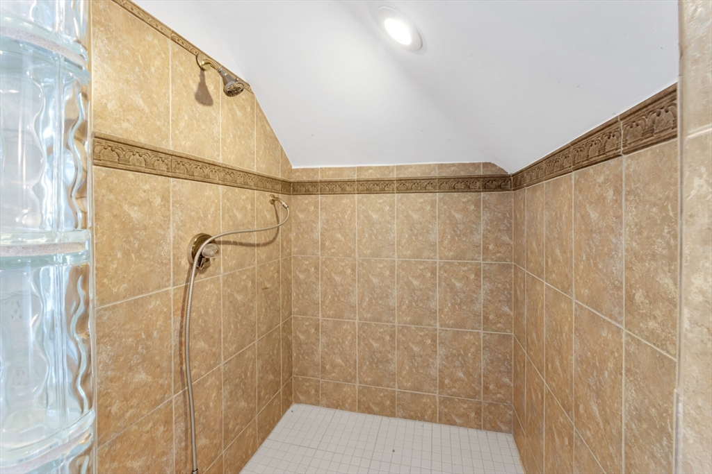 231 Lagrange Street Boston, MA 02132 - Photo 37 of 42 a bathroom with a shower