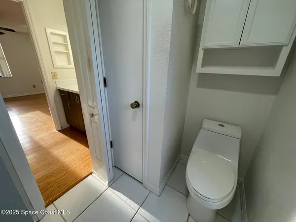 a bathroom with a toilet and a sink