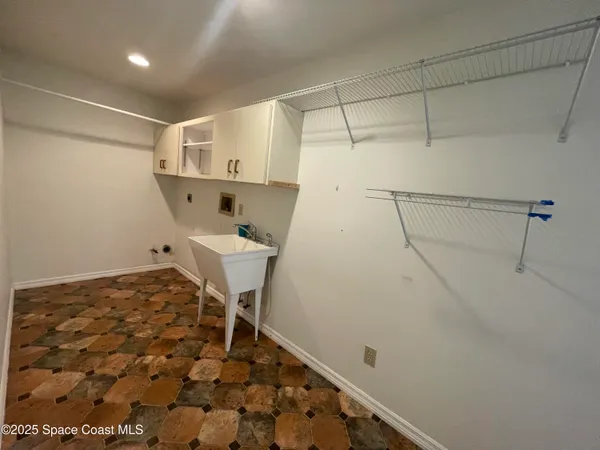 a bathroom with a sink and a shower