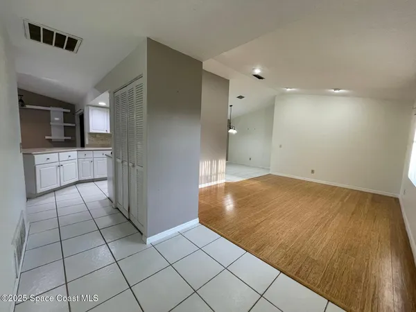 a view of a kitchen cabinets