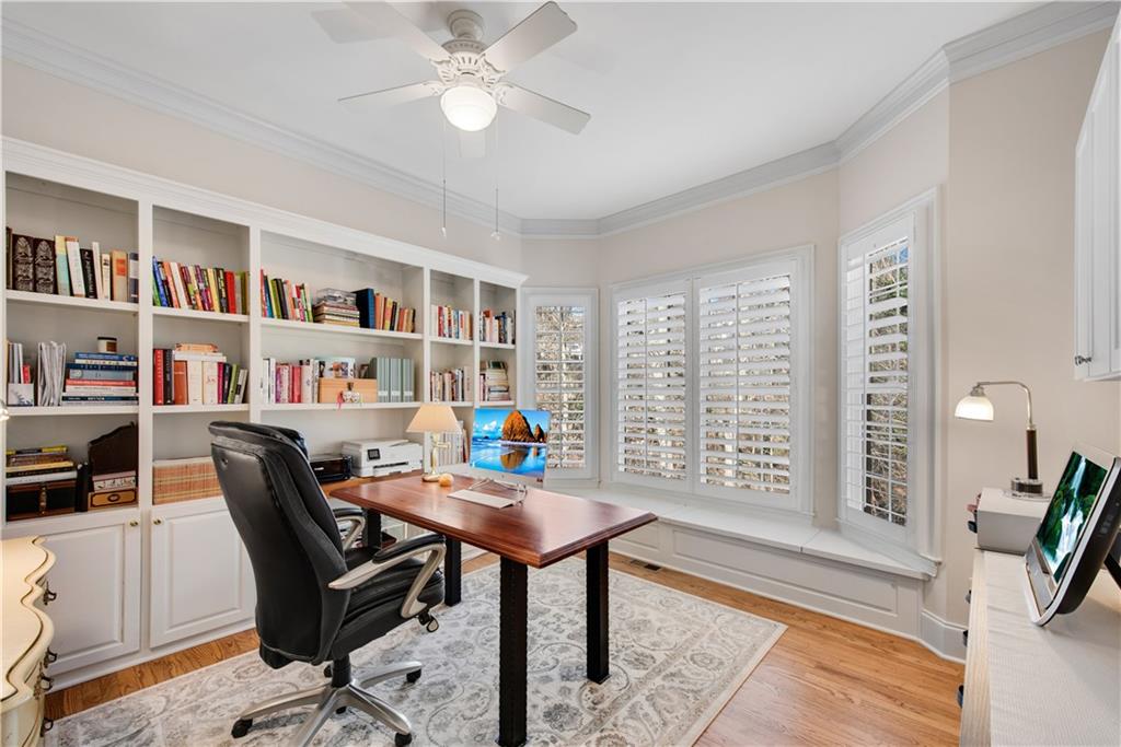 992 Wescott Lane Northeast Atlanta, GA 30342 - Photo 16 of 80 a workspace with furniture window and wooden floor