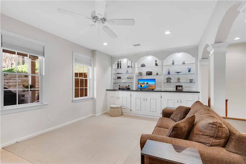 992 Wescott Lane Northeast Atlanta, GA 30342 - Photo 32 of 80 a living room with furniture and windows