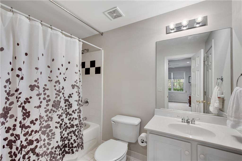 992 Wescott Lane Northeast Atlanta, GA 30342 - Photo 38 of 80 a bathroom with a sink toilet and shower