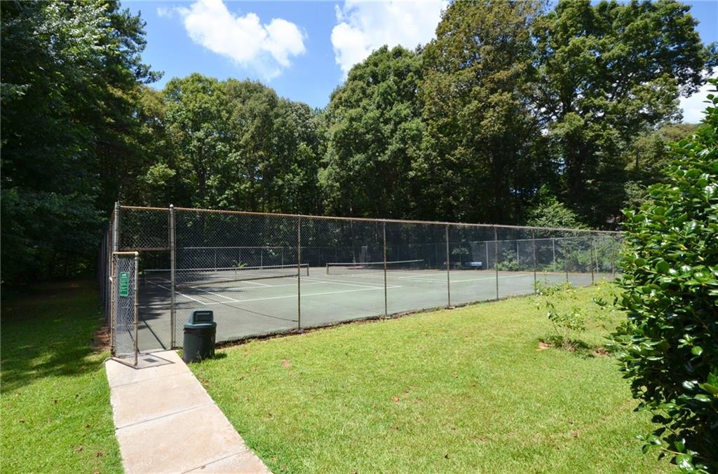 992 Wescott Lane Northeast Atlanta, GA 30342 - Photo 77 of 80 a view of a backyard with a small pool