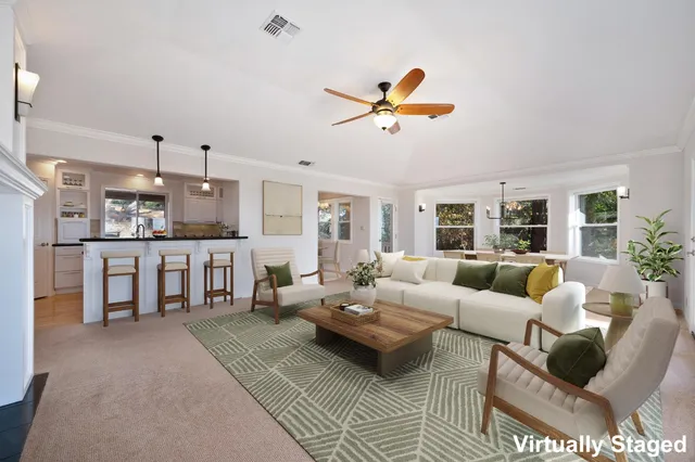 a view of a kitchen with a sink and a window