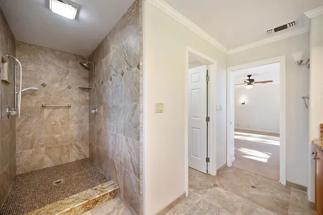 a view of a swimming pool with an outdoor seating