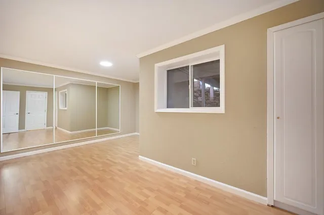 a view of a backyard with sitting area