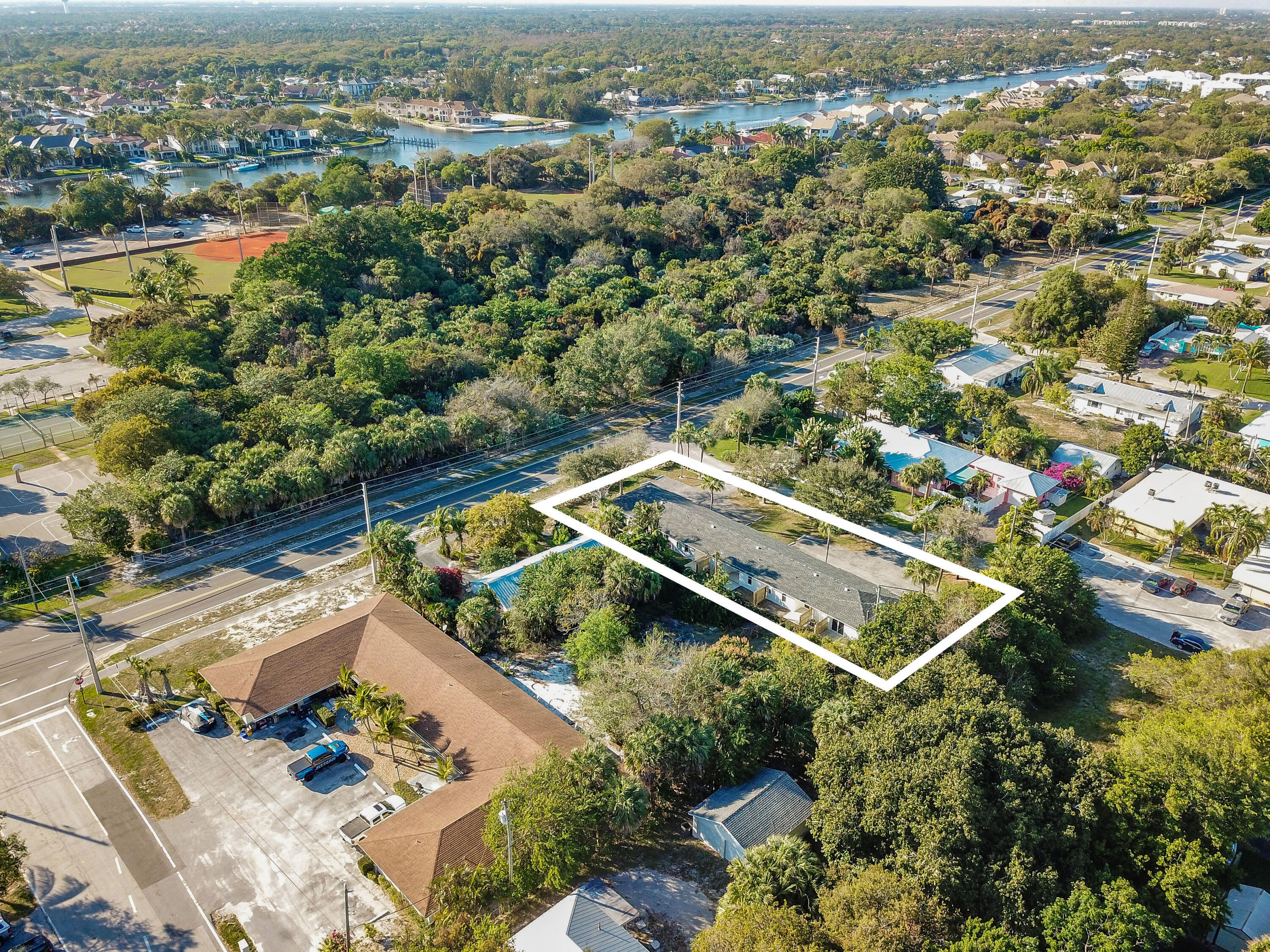 12058 Ellison Wilson Road North Palm Beach, FL 33408 - Photo 12 of 13 an aerial view of residential houses with outdoor space