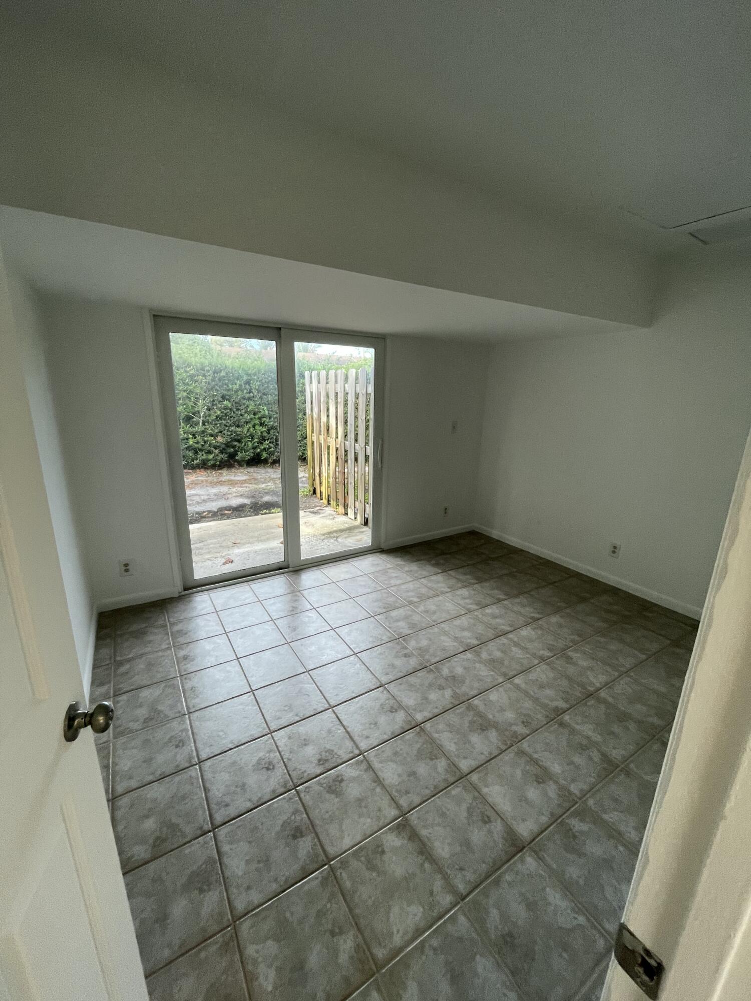 12058 Ellison Wilson Road North Palm Beach, FL 33408 - Photo 7 of 13 an empty room with windows