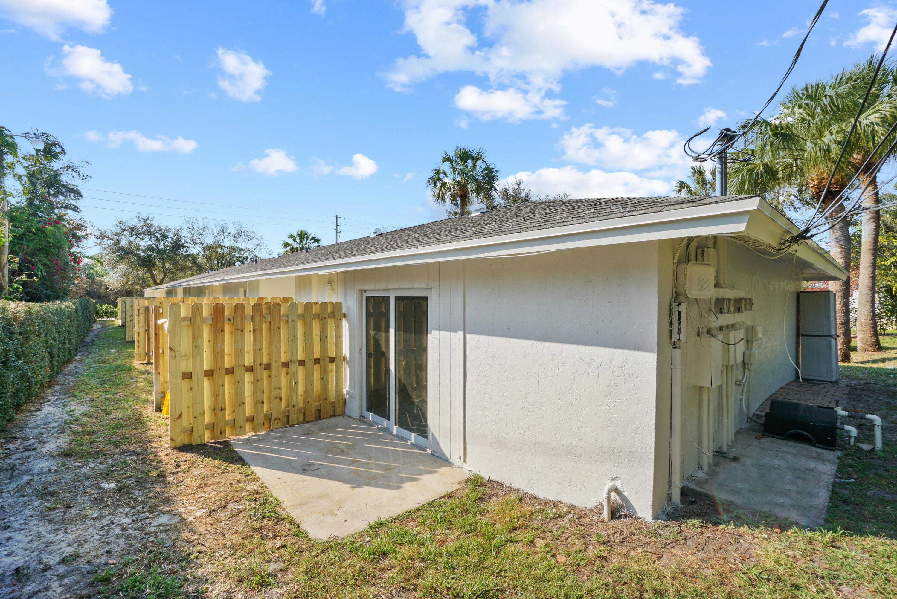 12058 Ellison Wilson Road North Palm Beach, FL 33408 - Photo 10 of 13 a view of a house with a backyard