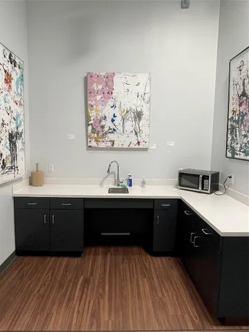 a spacious bathroom with a sink double vanity and a bathtub