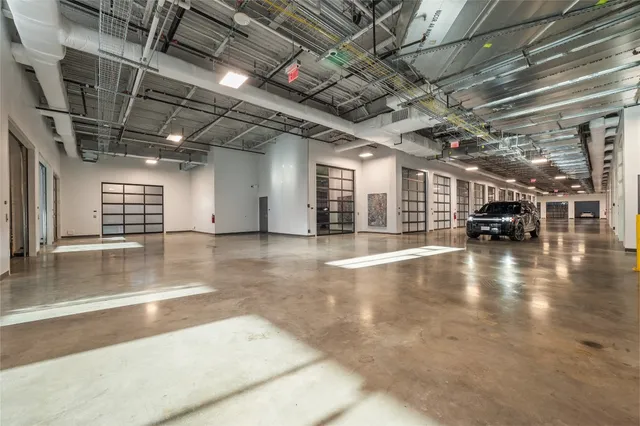 a view of a water heater room with a garage
