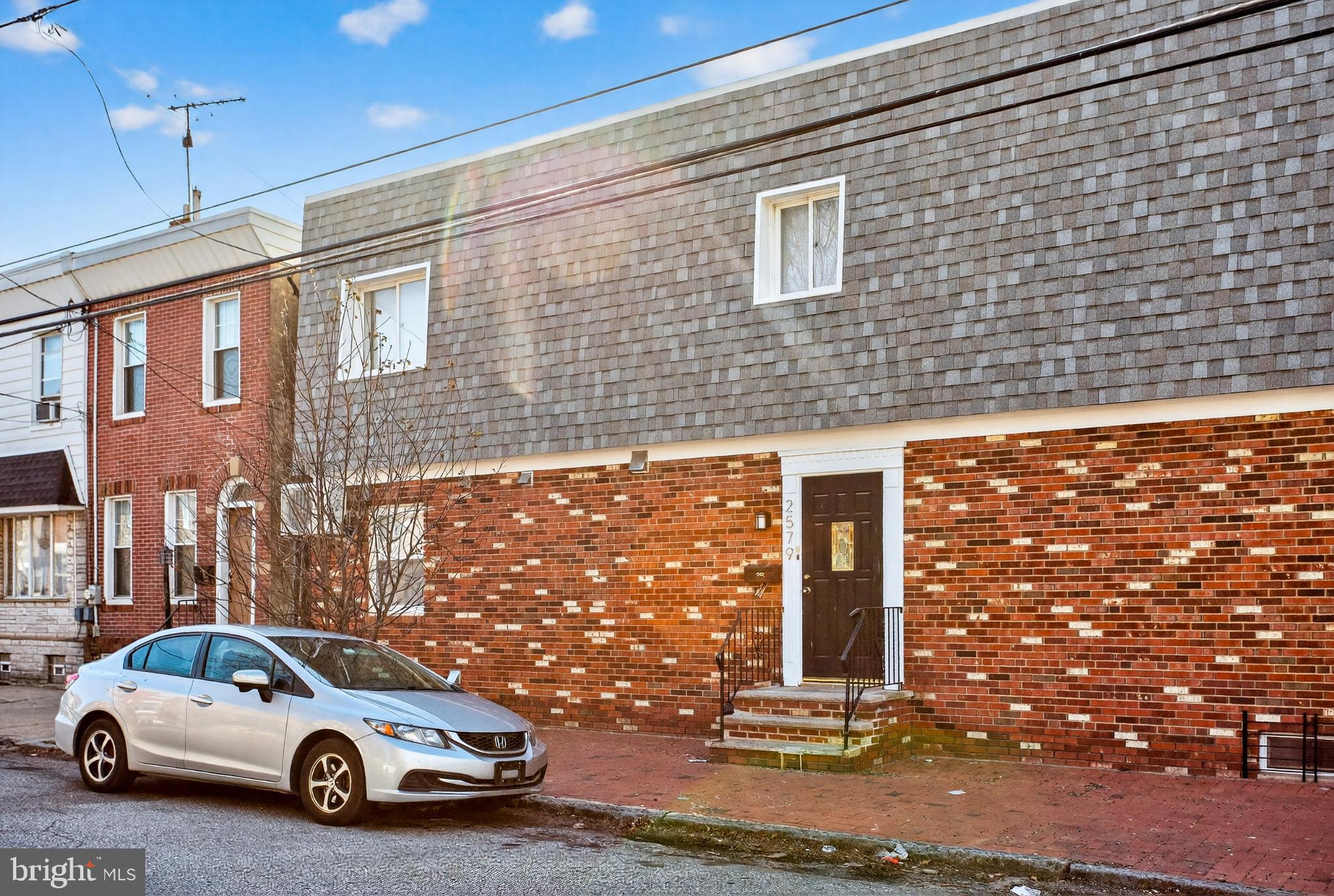 a car parked in front of a building