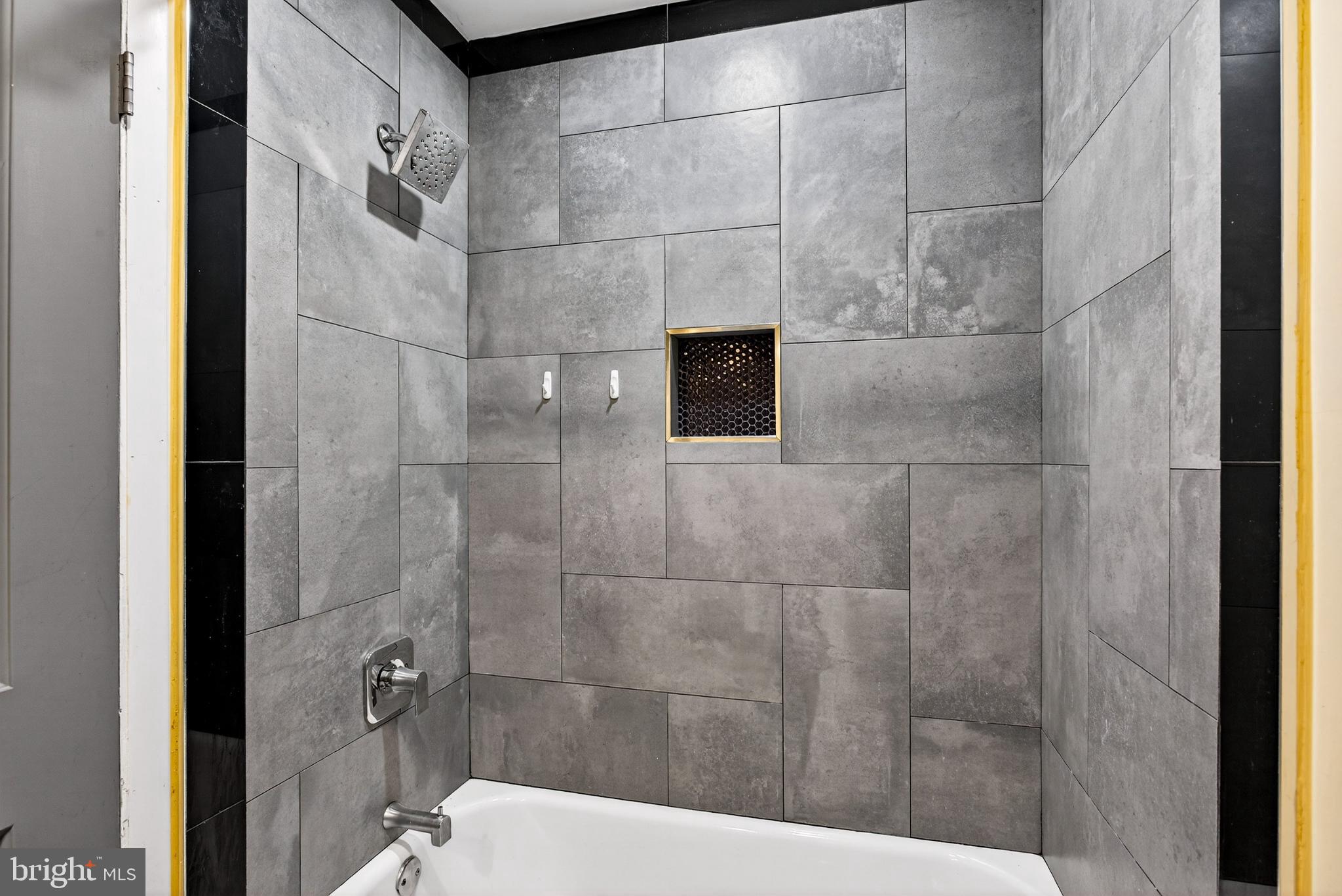 2579 Memphis Street, Unit 2 Philadelphia, PA 19125 - Photo 12 of 19 a bathroom with a shower and a sink