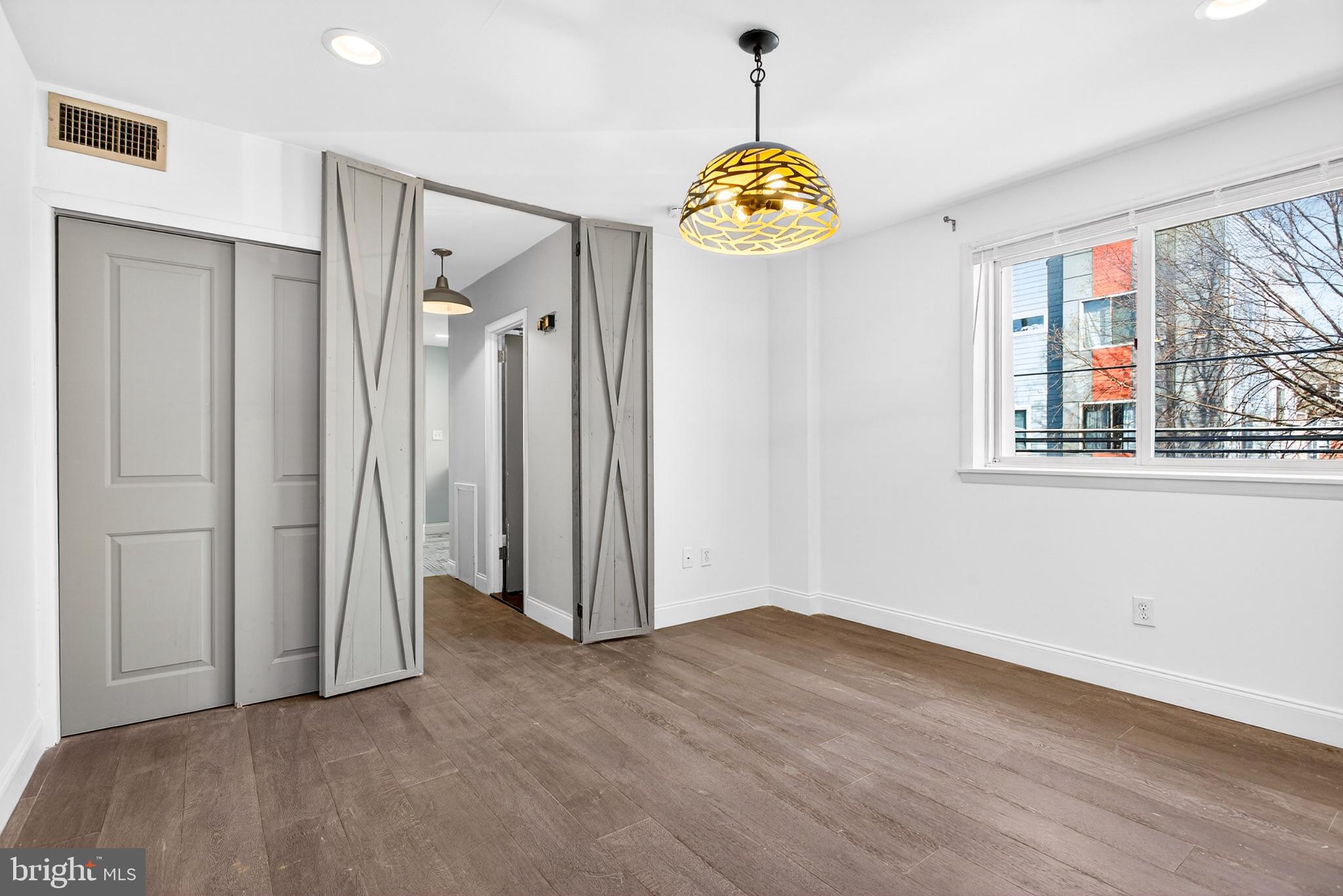 2579 Memphis Street, Unit 2 Philadelphia, PA 19125 - Photo 15 of 19 an empty room with a window