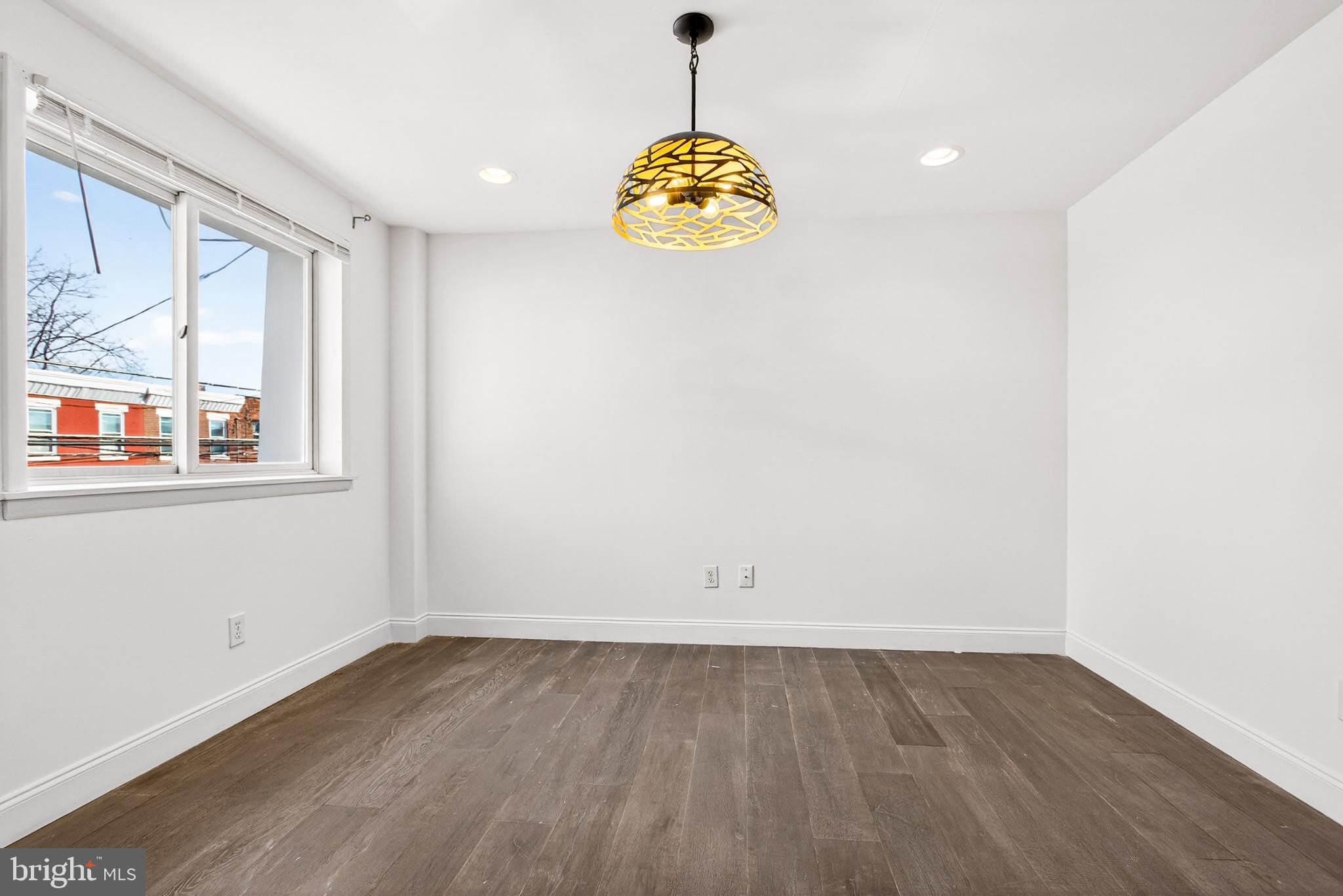 2579 Memphis Street, Unit 2 Philadelphia, PA 19125 - Photo 18 of 19 wooden floor in an empty room with a window