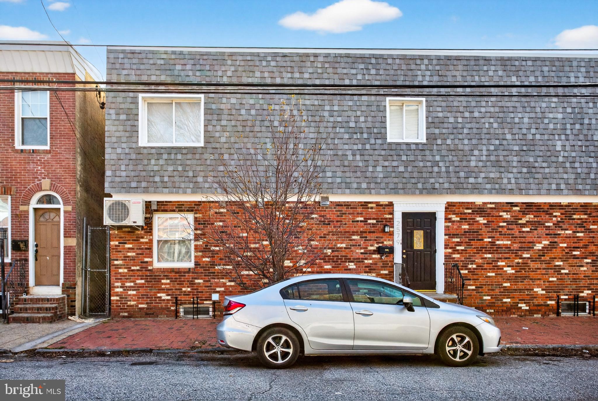 2579 Memphis Street, Unit 2 Philadelphia, PA 19125 - Photo 19 of 19 a car parked in front of a building