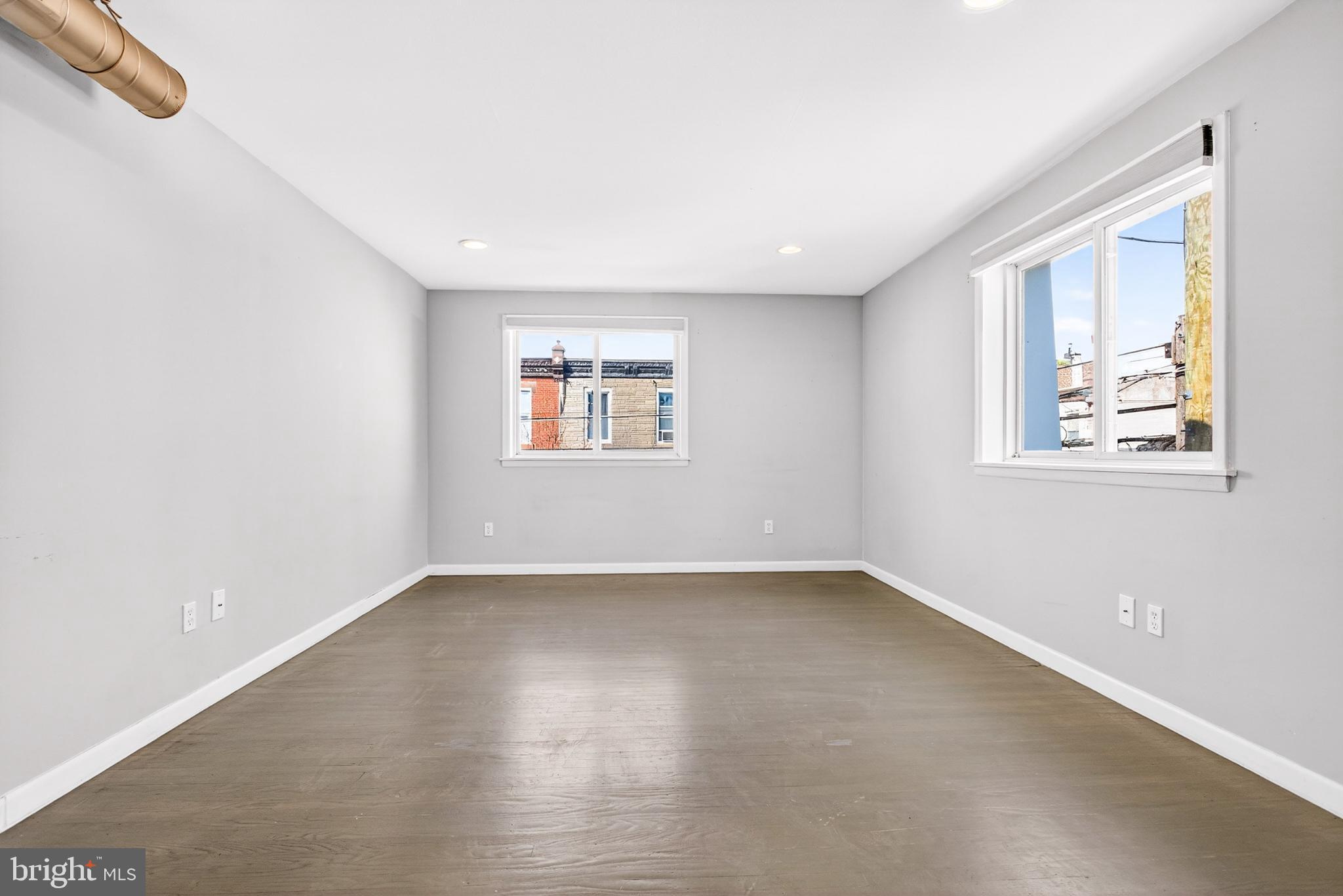 2579 Memphis Street, Unit 2 Philadelphia, PA 19125 - Photo 5 of 19 an empty room with windows