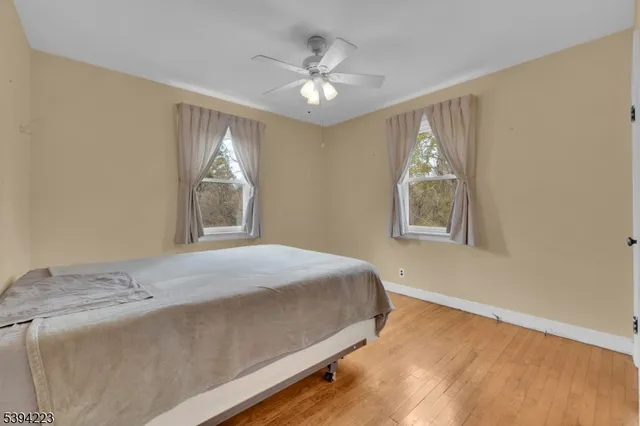 an aerial view of a house with mountain view