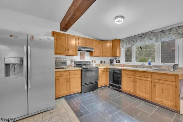 a view of an entryway with a lot of stuff