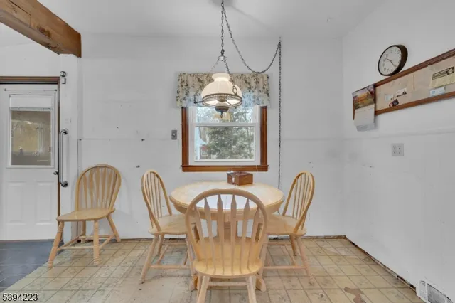 a kitchen with a sink cabinets and stainless steel appliances